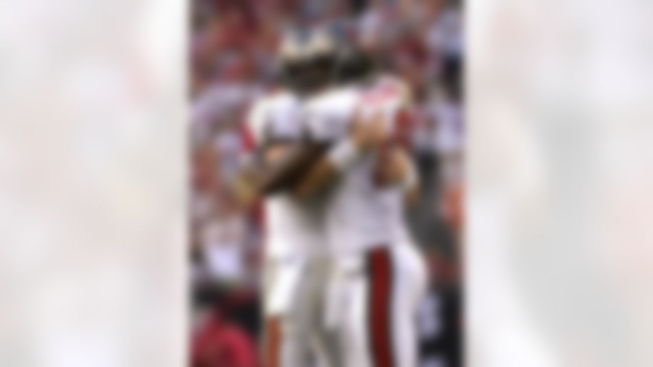 TAMPA, FL - OCTOBER 28: Quarterback Jeff Garcia #7 and wide receiver Ike Hilliard #19 of the Tampa Bay Buccaneers celebrate a touchdown against the Jacksonville Jaguars at Raymond James Stadium on October 28, 2007 in Tampa, Florida. The Jaguars won 24 - 23. (Photo by Al Messerschmidt/Getty Images)