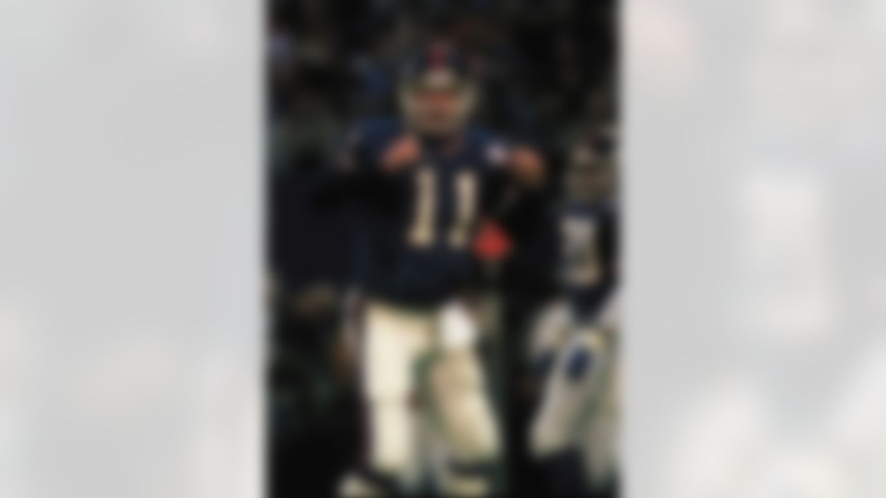 New York Giants quarterback Phil Simms reacts after throwing a first quarter touch down pass for 11yards to Lionel Manuel in the NFL championship game against the Washington Redskins on Sunday, Jan. 11, 1987 at Giants stadium in East Rutherford, N.J. (AP Photo/Elise Amondola)