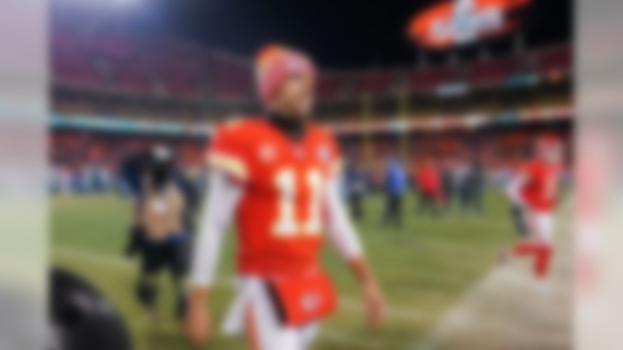 Kansas City Chiefs quarterback Alex Smith (11) walks off the field following the AFC wild-card game against the Tennessee Titans. The Chiefs lost to the Titans 22-21 in what many speculate to be Smith's last game as a Chief.