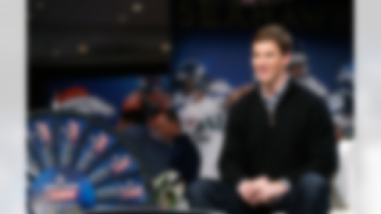 New York Giants quarterback Eli Manning is seen on the NFL.com LIVE set on Radio Row at the Super Bowl XLVIII media center in the Sheraton Hotel on Wednesday, January 29, 2014 in New York, NY. (Perry Knotts/NFL)