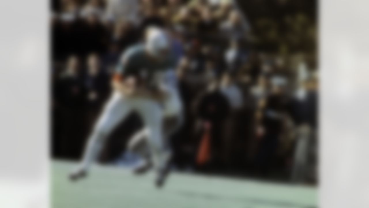 Hall of Fame defensive tackle Bob Lilly (74) of the Dallas Cowboys sacks Dolphins Hall of Fame quarterback Bob Griese (12) for an amazing 29-yard loss during the Cowboys 24-3 victory over the Miami Dolphins in Super Bowl VI on January 16, 1972 at Tulane Stadium in New Orleans, Louisiana. (National Football League)