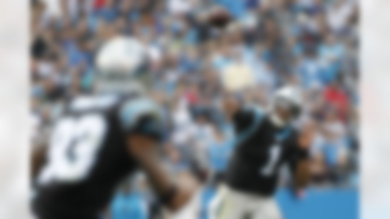 Carolina Panthers' Cam Newton (1) throws a pass against the Atlanta Falcons during the first half of an NFL football game in Charlotte, N.C., Sunday, Dec. 9, 2012. (AP Photo/Bob Leverone)