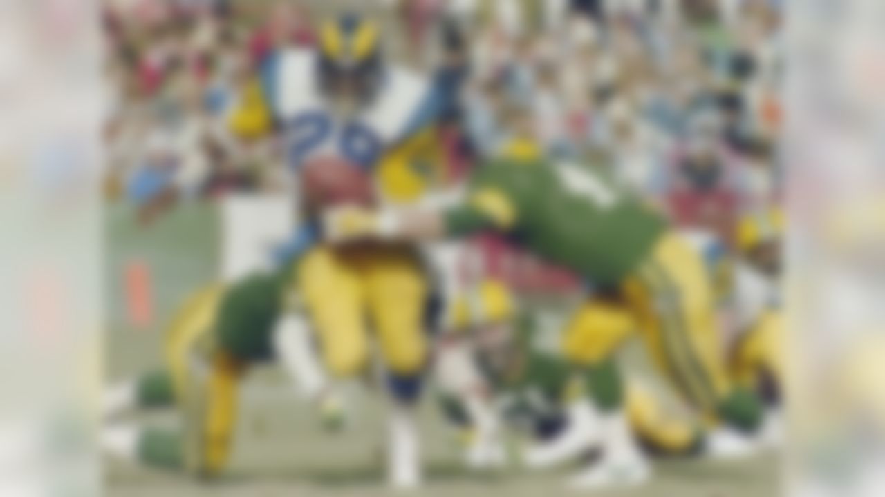 In 2012, Minnesota Vikings running back Adrian Peterson came within 10 yards of toppling one of the NFL's most prestigious records, Dickerson's single-season rushing yardage total of 2,105 (Peterson finished with 2,097). Dickerson set the record in just his second NFL season, averaging 131.6 yards a game and 5.6 yards per carry. In three of his first four seasons, Dickerson rushed for 1,800 or more yards.
» Play Record Breaker: Can you break Dickerson's record?