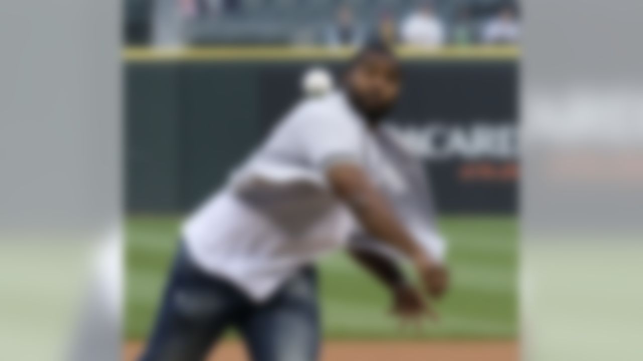 Chicago Bears linebacker Lance Briggs throws out a ceremonial first pitch before a baseball game between the Chicago White Sox and the Cleveland Indians, Thursday, May 19, 2011, in Chicago. (AP Photo/Charles Rex Arbogast)