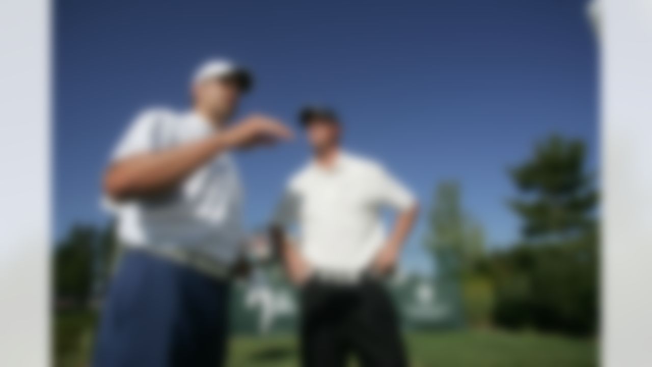 Aaron Rodgers, left, and Matt Ryan talk before teeing off during the American Century Golf Championship at Edgewood Tahoe Golf Course in Stateline, Nev., on Friday, July 17, 2009. (AP Photo/Brad Horn)