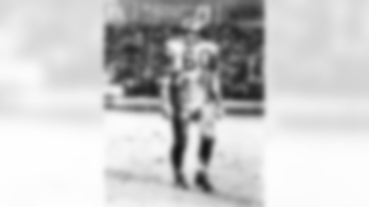 Philadelphia Eagles linebacker Chuck Bednarik (60) walks off the field in the rain during an NFL game against the New York Giants at Yankee Stadium, Nov. 12, 1961. The Giants defeated the Eagles 38-21. (Pro Football Hall of Fame)