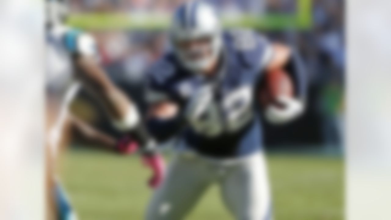 Dallas Cowboys tight end Jason Witten (82) runs after a catch during an NFL football game against the Carolina Panthers on Sunday, October 21, 2012, at Bank of America Stadium in Charlotte, North Carolina. The Cowboys defeated the Panthers, 19-14. (AP Photo/James D Smith)