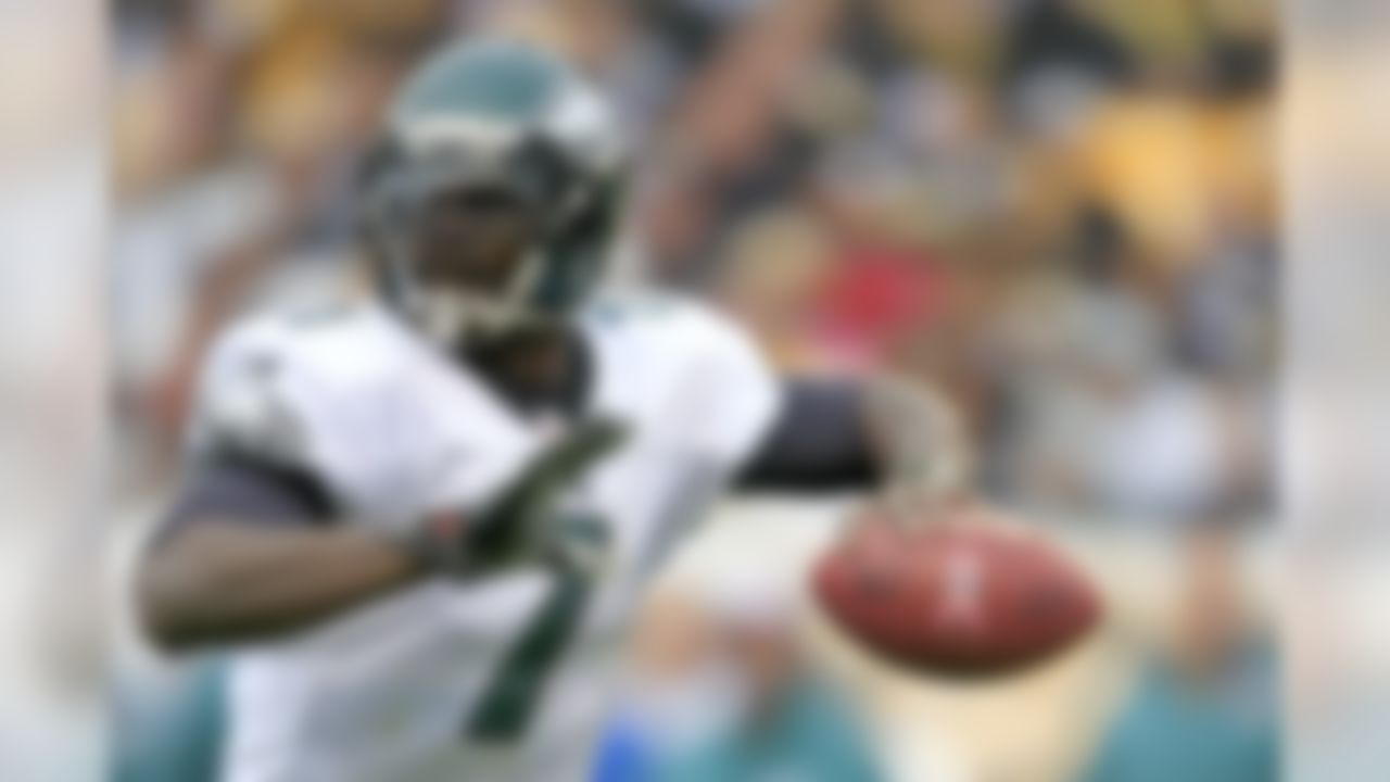 This Oct. 7, 2012 file photo shows Philadelphia Eagles quarterback Michael Vick (7) looking to pass in the third quarter of an NFL football game against the Pittsburgh Steelers in Pittsburgh. Despite speculation that Vick's starting job was in jeopardy, he's still the No. 1 quarterback for the Eagles. He'll face his old team on Sunday, the Atlanta Falcons (6-0). (AP Photo/Gene J. Puskar, File)