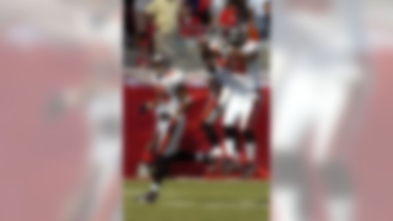 TAMPA, FL - OCTOBER 14: Wide receiver Joey Galloway #84 of the Tampa Bay Buccaneers celebrates a 69-yard touchdown pass with wide receiver Ike Hilliard #19 against the Tennessee Titans at Raymond James Stadium on October 14, 2007 in Tampa, Florida. The Bucs won 13 - 10.(Photo by Al Messerschmidt/Getty Images)