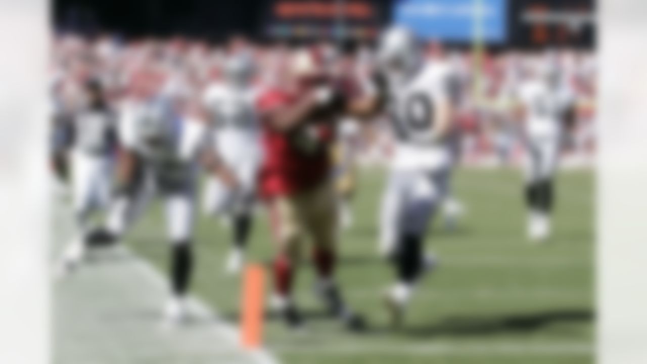 San Francisco 49ers running back Mauriced Hicks leaps into the end zone to score on a 33-yard reception during a 34 to 20 win over the Oakland Raiders at Monster Park in San Francisco, California on October 8, 2006. Photo by Getty Images.