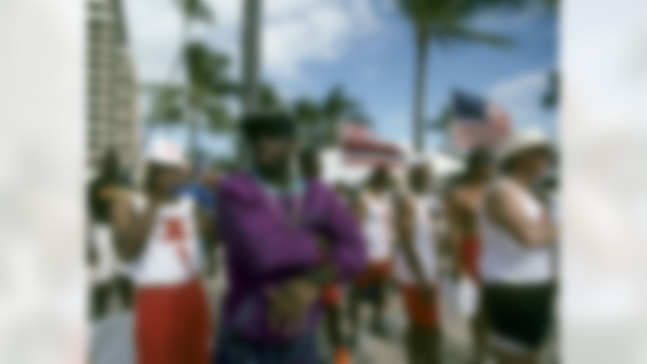 Deion "Primetime" Sanders hangs out with members of the AFC squad during the "Beach Challenge" before the AFC's 23-20 overtime victory over the NFC in the 1993 NFL Pro Bowl played on February 7, 1993 at Aloha Stadium in Honolulu, Hawaii. (National Football League)