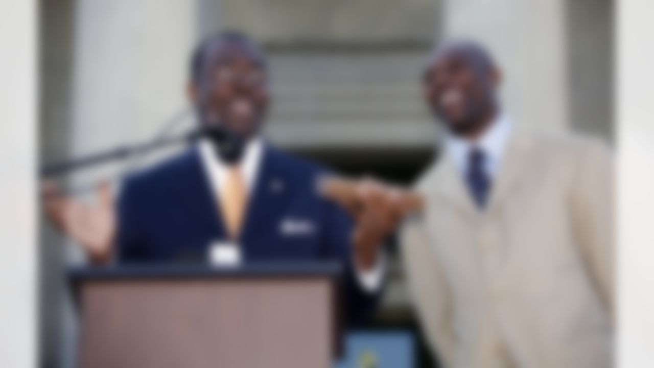 Buffalo Bills' Terrell Owens, right, accepts the key to the city from Buffalo Mayor Byron Brown, in Buffalo, N.Y., Monday, May 18, 2009. (AP Photo/David Duprey)