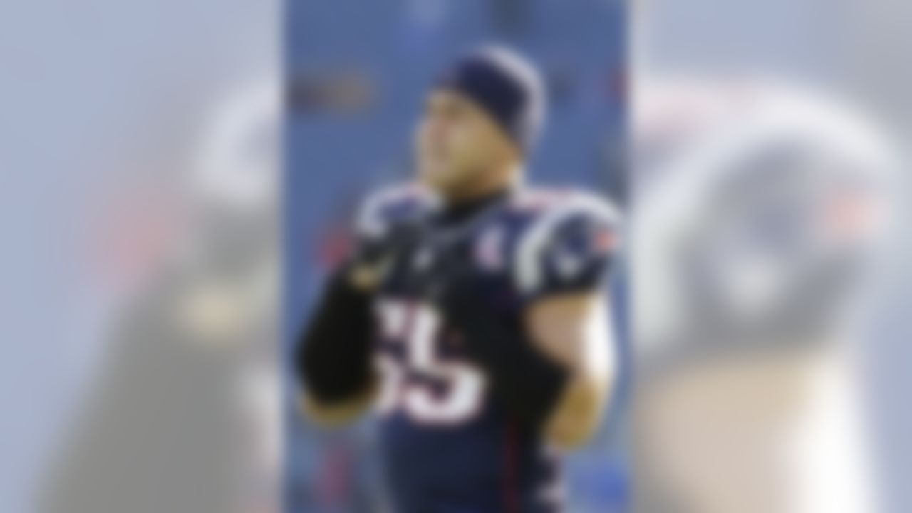 New England Patriots linebacker Junior Seau (55) during warm-up before an NFL wild-card playoff football game in Foxborough, Mass., Sunday, Jan. 10, 2010. (AP Photo/Elise Amendola)