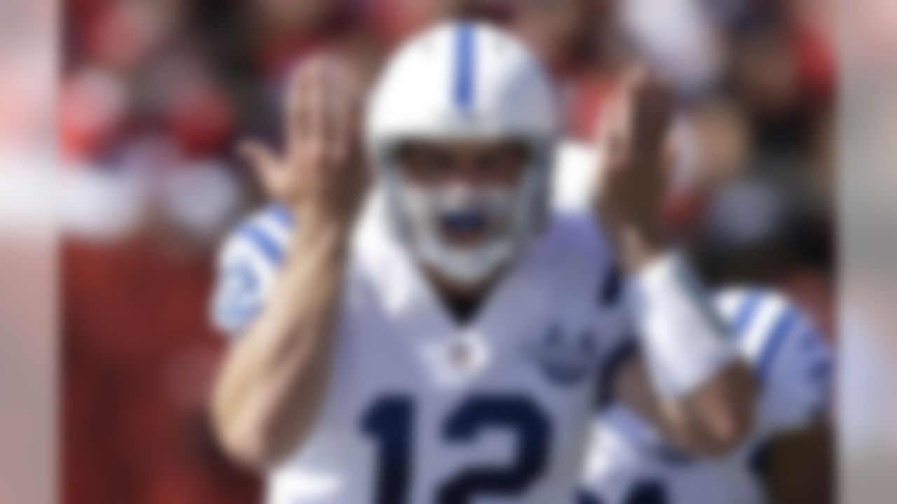 Indianapolis Colts quarterback Andrew Luck signals at the line of scrimmage during his team's game against the San Francisco 49ers. (AP Photo/Ben Margot)