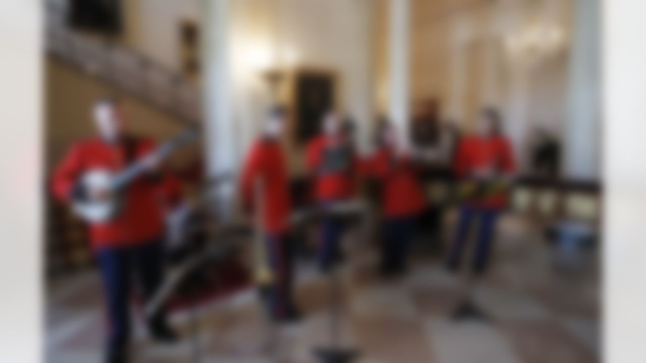 The President's Own Marine Band plays jazz music in the Grand Foyer of the White House in Washington, Monday, Aug. 9, 2010, as President Barack Obama honored the 2009 NFL Super Bowl Football Champions New Orleans Saints in the East Room . (AP Photo/Charles Dharapak)