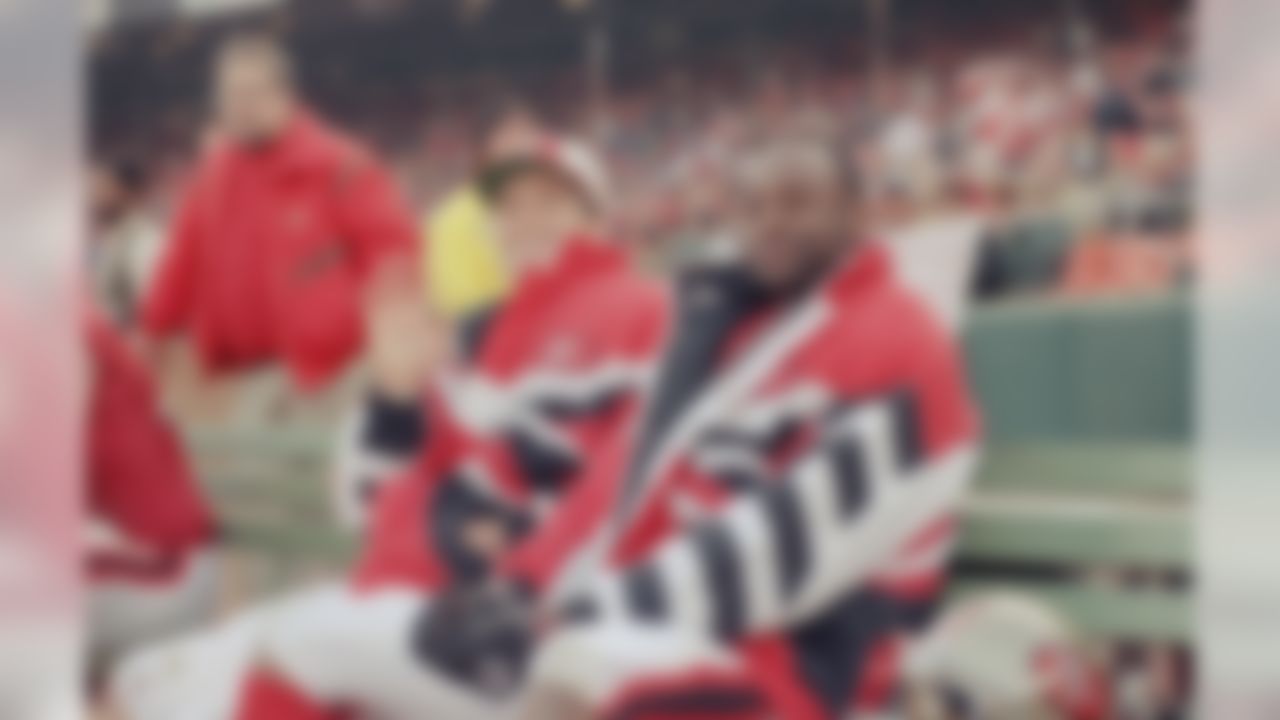 San Francisco 49ers quarterback Steve Young, left, and wide receiver Jerry Rice sit on the bench and watch the second string take over during the fourth quarter against the Denver Broncos in San Francisco on Saturday, Dec. 17, 1994. The 24ers won their tenth straight game with a 42-19 win over Denver. (AP Photo/Susan Ragan)
