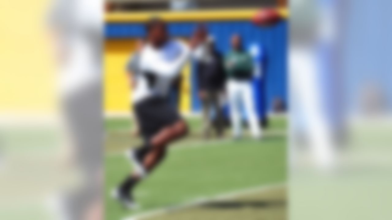 Linebacker Akeem Ayers works out during UCLA pro day at Spaulding Field in Los Angeles, CA on March 29, 2011. (Gary A. Vasquez/NFL)