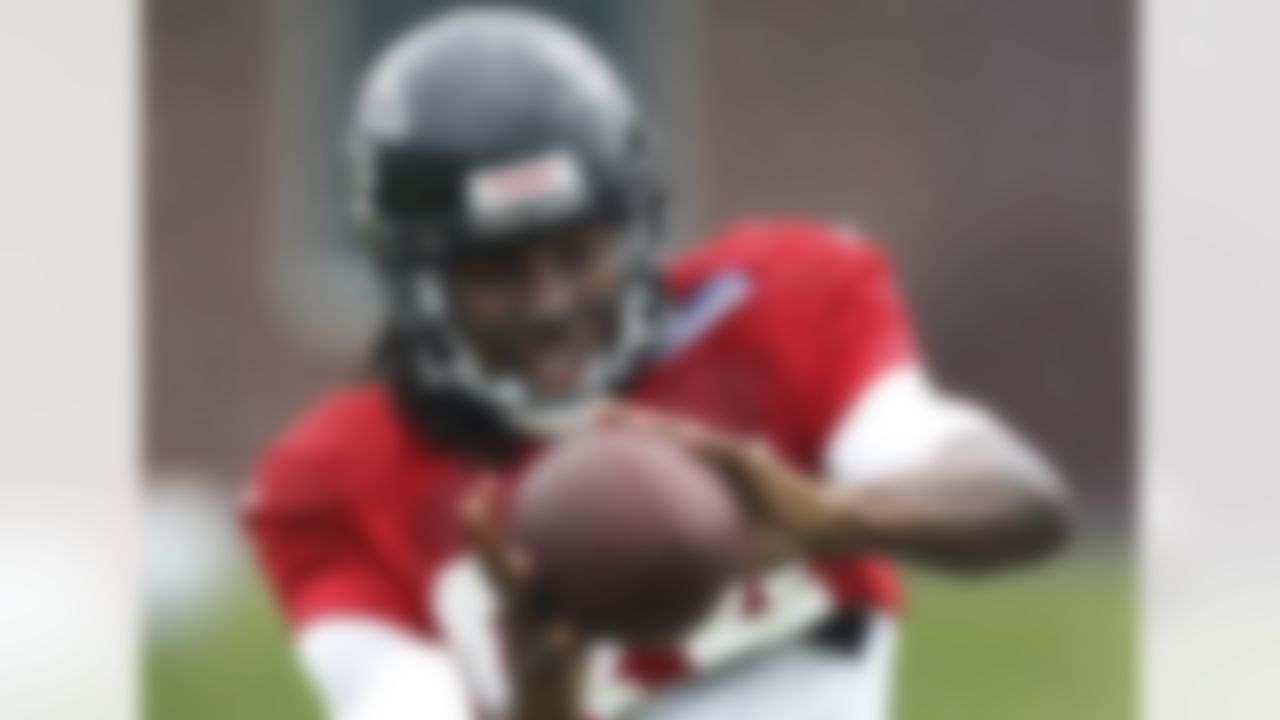 Atlanta Falcons wide receiver Roddy White (84) gets warmed up during football training camp in Flowery Branch, Ga., Tuesday, July 31, 2012. (AP Photo/John Bazemore)