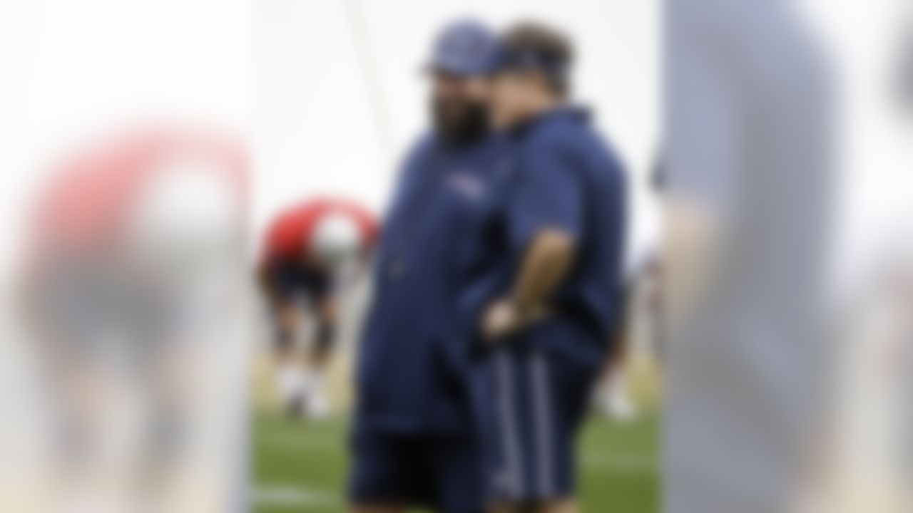 New England Patriots head coach Bill Belichick talks with defensive coordinator Matt Patricia, left, during practice Thursday, Jan. 29, 2015, in Tempe, Ariz. The Patriots play the Seattle Seahawks in NFL football Super Bowl XLIX Sunday, Feb. 1. (AP Photo/Mark Humphrey)