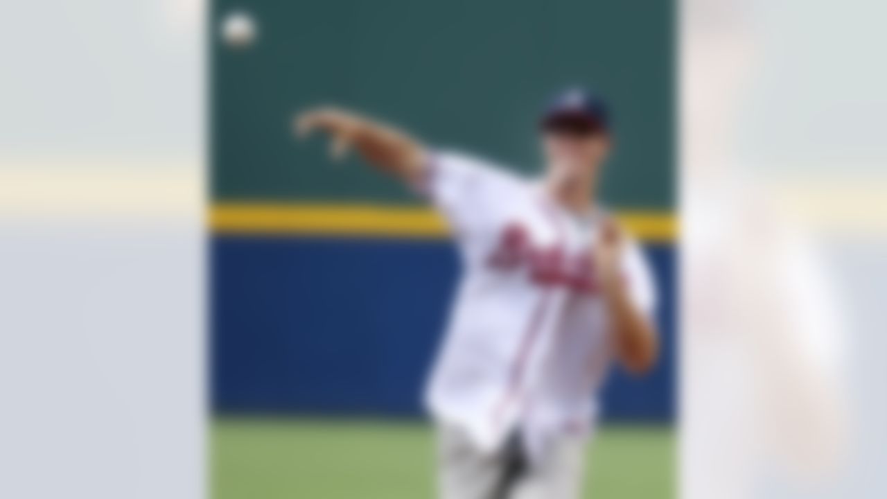 Atlanta Falcons NFL football quarterback Matt Ryan throws out the ceremonial first pitch before a baseball game between the Atlanta Braves and the Tampa Bay Rays, Wednesday, June 16, 2010, in Atlanta. (AP Photo/John Bazemore)
