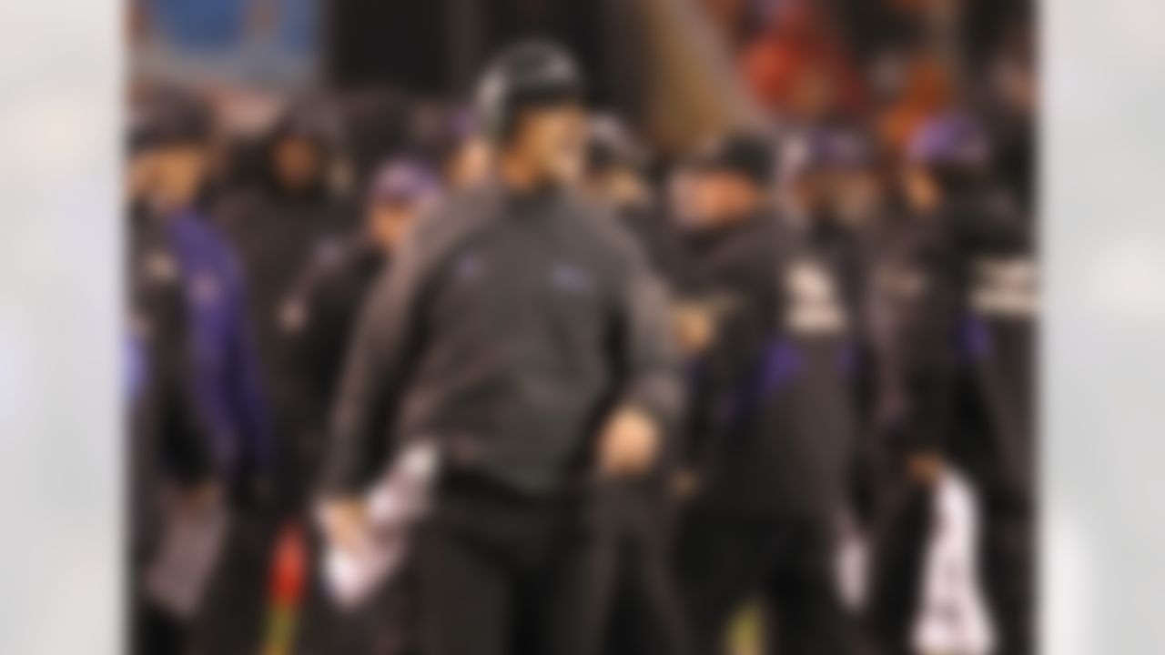 Baltimore Ravens head coach John Harbaugh works the bench against the Cleveland Browns in the second quarter of an NFL football game on Sunday, Dec. 4, 2011, in Cleveland. (AP Photo/Amy Sancetta)