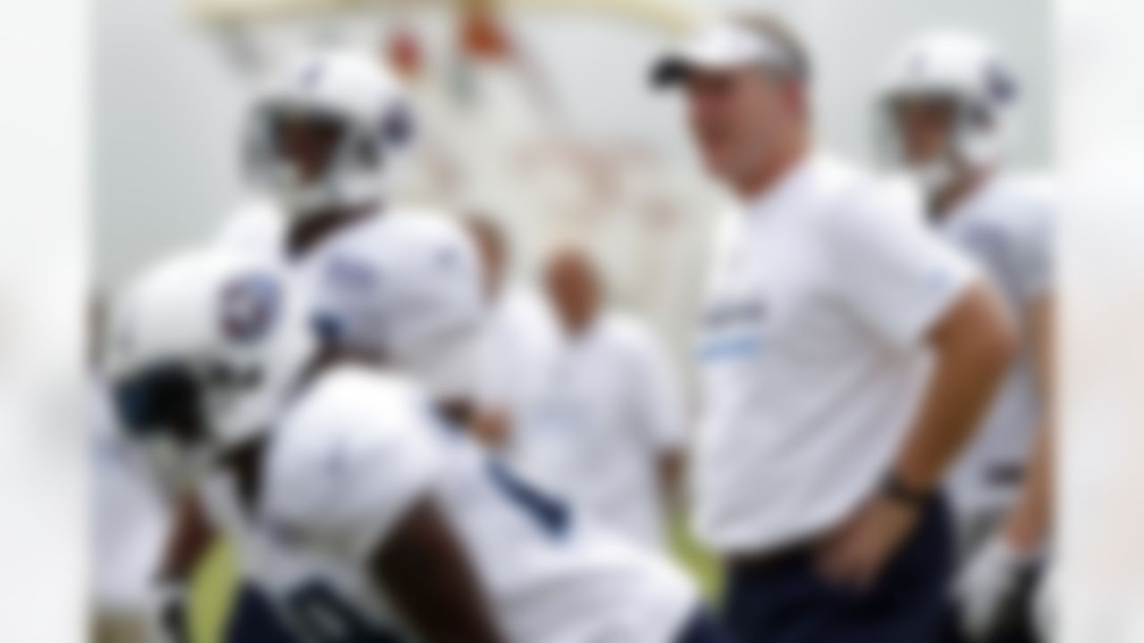 Tennessee Titans head coach Mike Munchak watches action during NFL football camp at Titans' headquarters Monday, July 30, 2012 Nashville, Tenn. (AP Photo/Wade Payne)