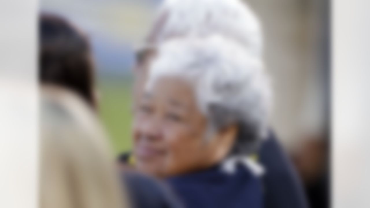 The mother of the late Junior Seau, Luisa Seau, looks back during a public memorial service for the football player at Qualcomm Stadium, Friday, May 11, 2012, in San Diego. Junior committed suicide on May 2 at his Oceanside, Calif., home. He played parts of 20 seasons in the NFL, with the San Diego Chargers, Miami Dolphins and New England Patriots. (AP Photo/ Gregory Bull)