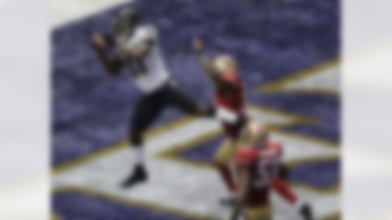 Baltimore Ravens wide receiver Anquan Boldin (81) catches a 13-yard pass for a touchdown as San Francisco 49ers linebacker NaVorro Bowman (53) trails the play during the first half of the NFL Super Bowl XLVII football game, Sunday, Feb. 3, 2013, in New Orleans. (AP Photo/Charlie Riedel)
