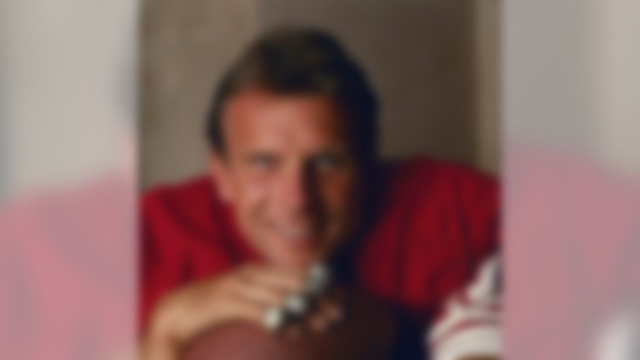 San Francisco 49ers Hall of Fame quarterback Joe Montana (16) poses with his four Super Bowl rings for his ProLine Profile trading card during a photo shoot in Santa Clara, Calif., April 21, 1992. (National Football League)