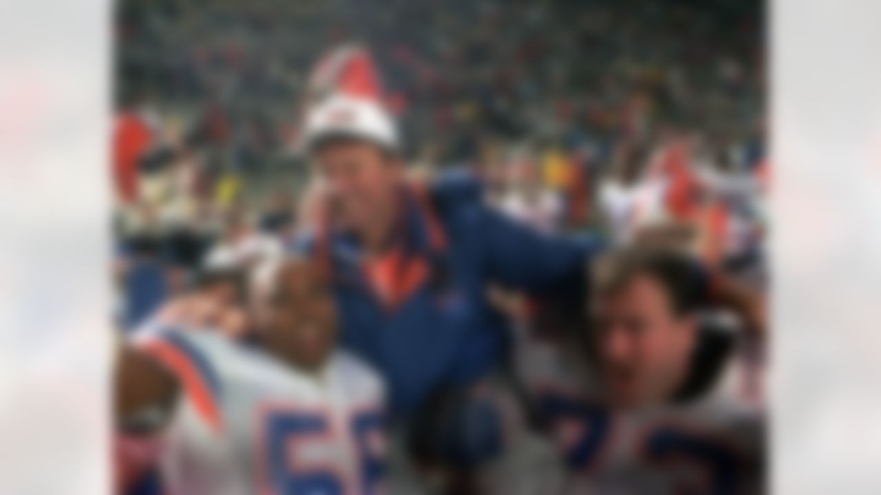 Florida Gators head coach Steve Spurrier is carried on the field by Cameron Davis (56) and Jim Watson (73) after the Gators downed the Alabama Crimson Tide, 28-3, in the 1993 SEC Football Championship in Birmingham, Ala., Dec.4, 1993. (AP photo/Dave Martin)