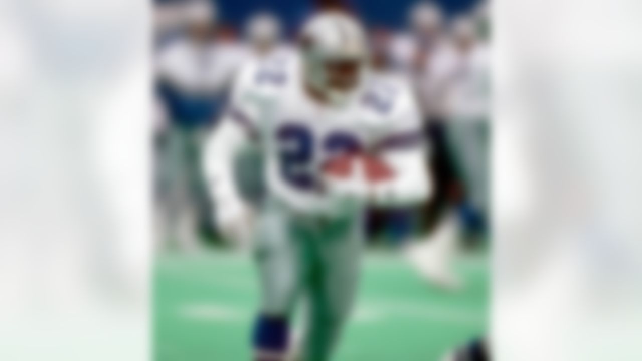 In 15 seasons with the Cowboys and Cardinals, Emmitt Smith gained 18,355 rushing yards.