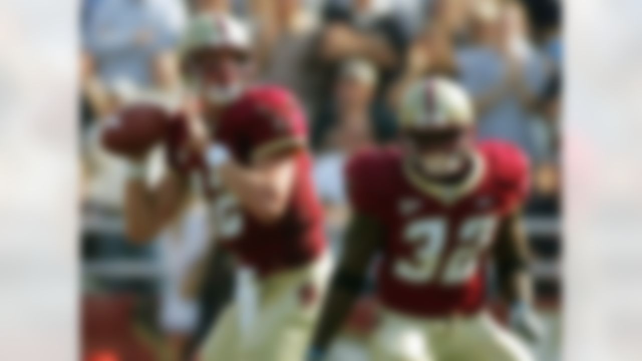 Boston College quarterback Matt Ryan (12) looks to pass as running back Andre Callender (32) defends during the fourth quarter of a college football game against Brigham Young University on Sept. 16, 2006 in Boston. (AP Photo/Michael Dwyer)