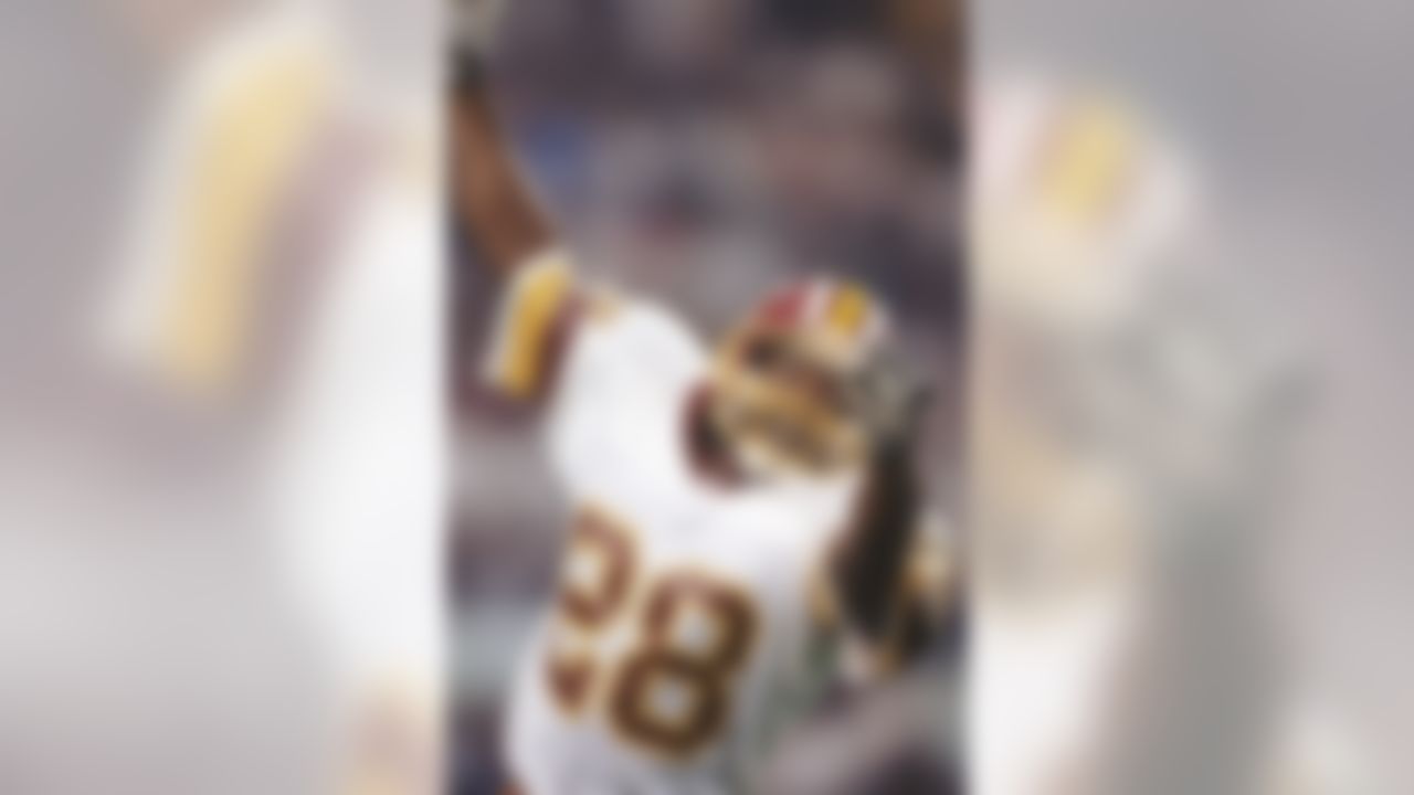 26 Jan 1992: Defensive back Darrell Green of the Washington Redskins celebrates during Super Bowl XXVI against the Buffalo Bills at the Hubert H. Humphrey Metrodome in Minneapolis, Minnesota. The Redskins won the game, 37-24. (Mandatory Credit: Mike Powell/NFL)