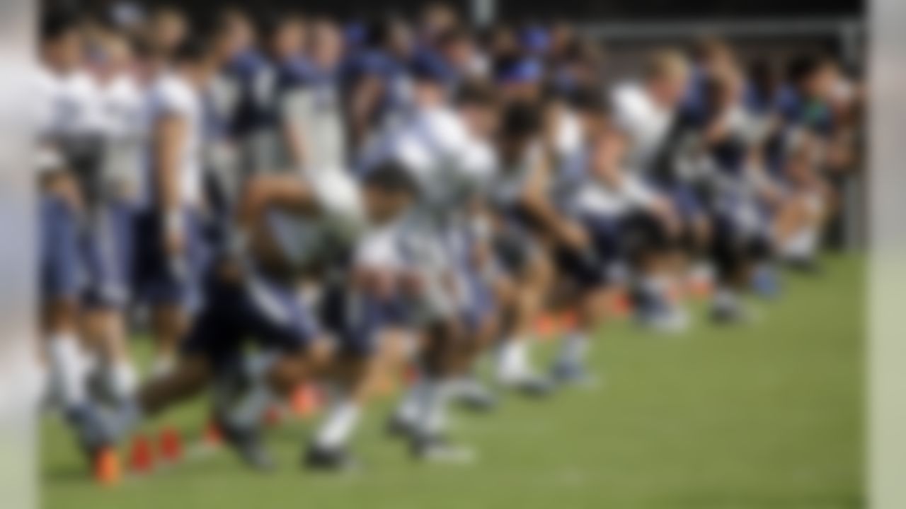 BYU players works out during an NCAA football practice, Wednesday, Aug. 12, 2015, in Provo, Utah. BYU running back Jamaal Williams withdrew from the school last week due to personal reasons. The offense must now adjust without their most talented running back.  (AP Photo/Rick Bowmer)