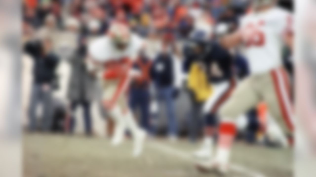San Francisco 49ers? Jerry Rice, left, passes Chicago Bears? Vestee Jackson (24) as he catches a 27-yard touchdown pass during second quarter action in the NFC Championship game in Chicago on Sunday, Jan. 8, 1989. (AP Photo/John Swart)