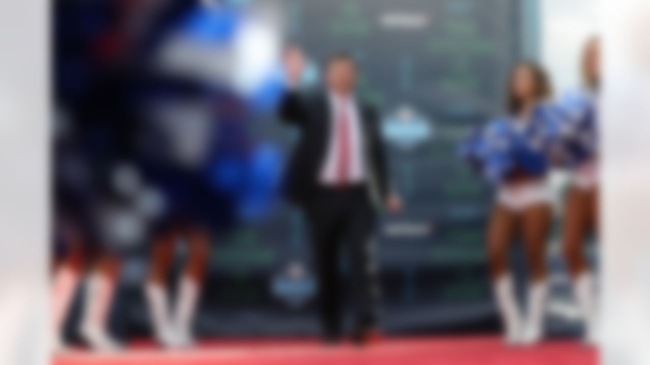 University of Georgia head coach Kirby Smart walks down the red carpet.
