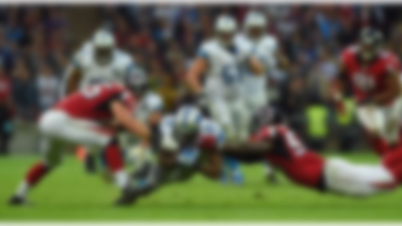 Detroit Lions wide receiver Jeremy Ross (12), centre, makes a down during the NFL football game against Atlanta Falcons at Wembley Stadium, London, Sunday, Oct. 26, 2014. (AP Photo/Tim Ireland)