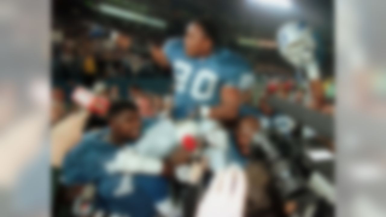 Detroit Lions running back Barry Sanders is carried around the field by teammates after he rushed for 184 yards and the winning touchdown in a 13-10 comeback victory against the New York Jets at the Silverdome in Pontiac, Mich., Dec. 21, 1997. (AP Photo)
