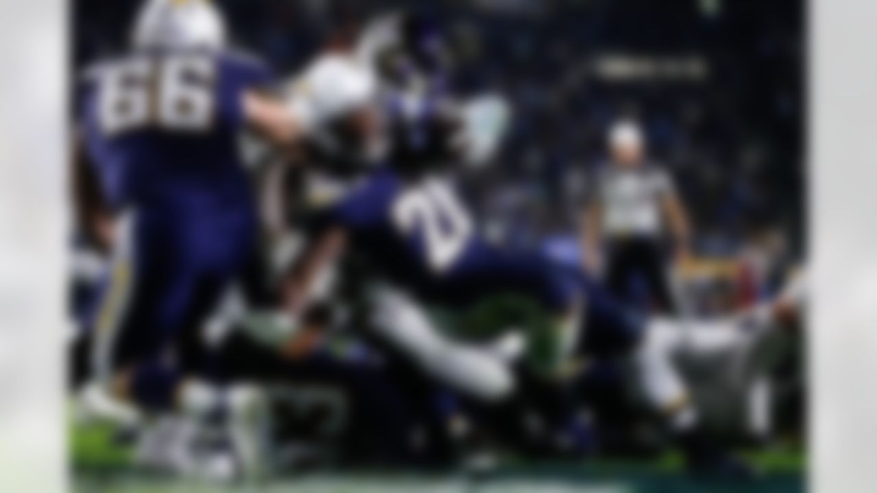 Los Angeles Chargers running back Melvin Gordon scores against the Baltimore Ravens during the second half in an NFL football game Saturday, Dec. 22, 2018, in Carson, Calif.