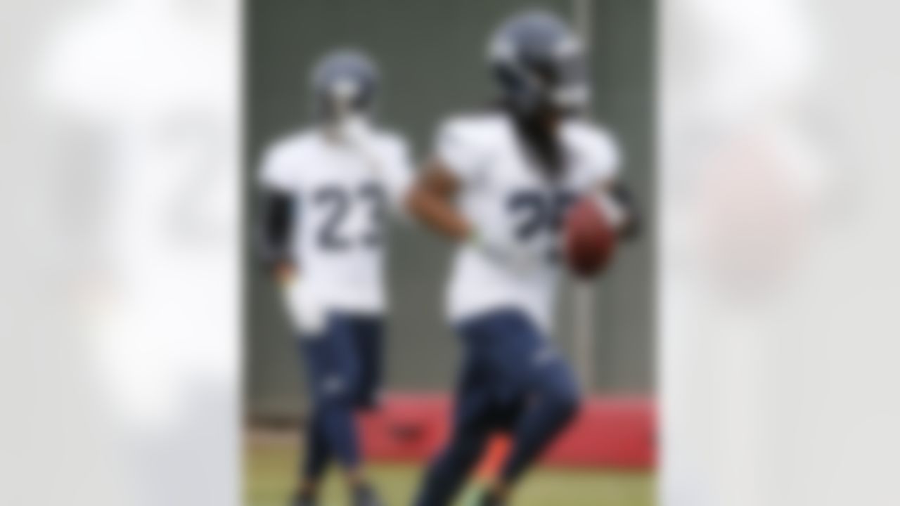 Seattle Seahawks' Richard Sherman run drills during a team practice for NFL Super Bowl XLIX football game, Wednesday, Jan. 28, 2015, in Tempe, Ariz. The Seahawks play the New England Patriots in Super Bowl XLIX on Sunday, Feb. 1, 2015. (AP Photo/Matt York)