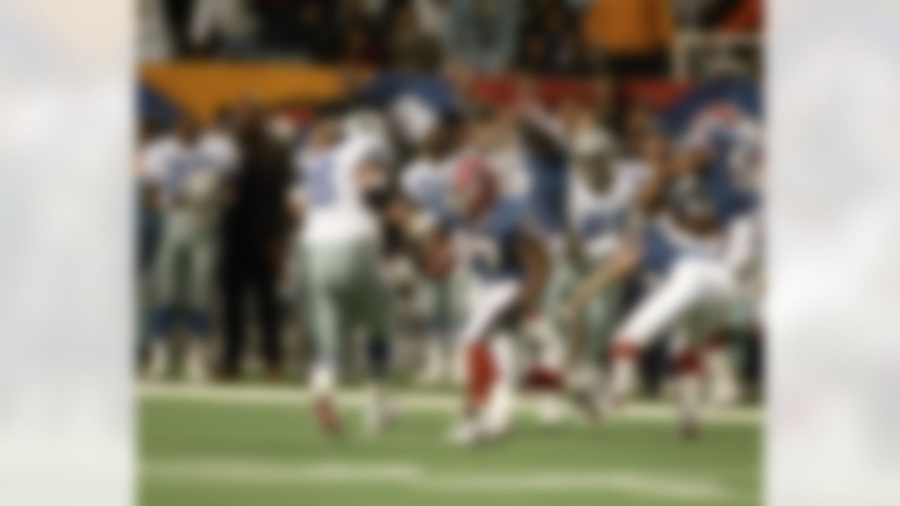 Buffalo Bills cornerback Nate Odomes (37) returns an interception 41 yards during Super Bowl XXVIII, a 30-13 loss to the Dallas Cowboys on January 30, 1994, at the Georgia Dome in Atlanta, Georgia. (National Football League)