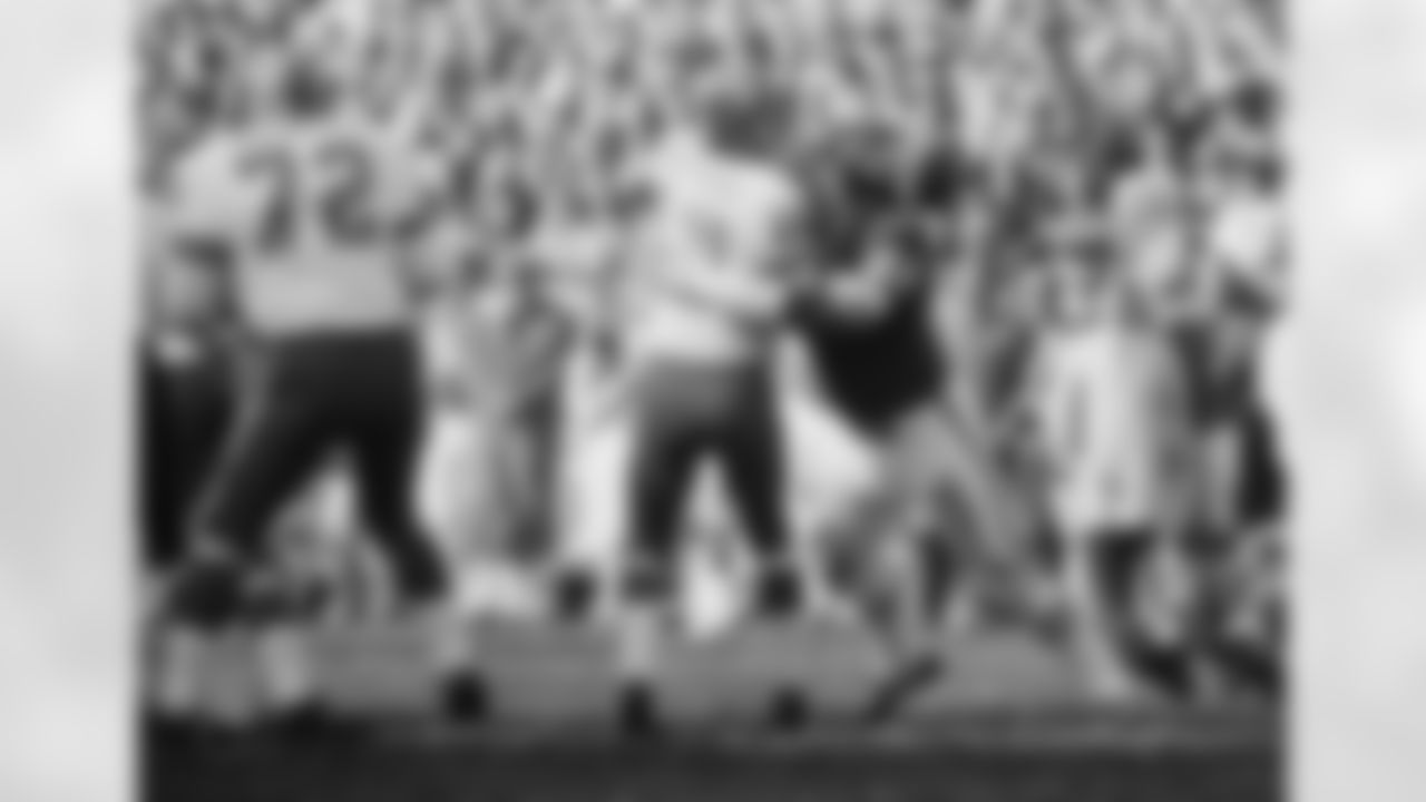 Kansas City's Curley Culp drives in and hits Denver's quarterback Al Pastrana with the smashing tackle, causing Pastrana to lose the ball in the game at Kansas City, Dec. 7, 1970. Chiefs scored the only touchdown of the game. (Associated Press