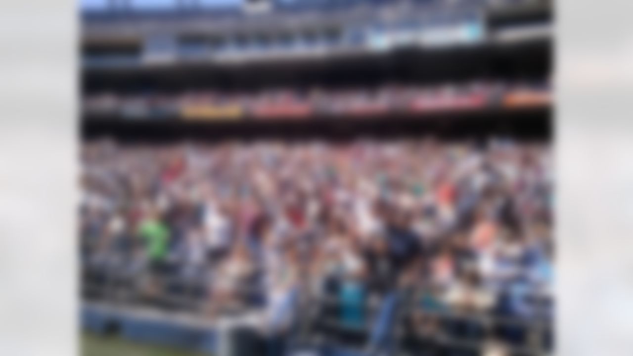 Fans react in the stands before watching New York Jets quarterback Tim Tebow deliver a sermon at Qualcomm Stadium in San Diego, California on June 17, 2012. (Kenny Legan/NFL)