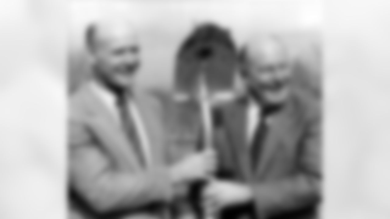 Dallas Cowboys general manager Tex Schramm, right, shares a shovel with coach Tom Landry at the ground breaking of the Cowboys practice facility in Irving, Texas, in this Nov. 30, 1983 photo. (Associated Press)