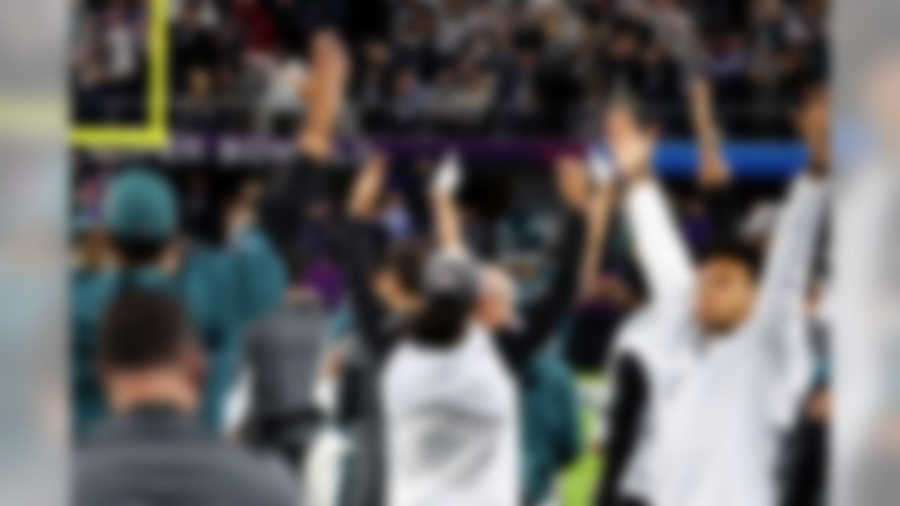 The Philadelphia Eagles celebrate on the sideline.