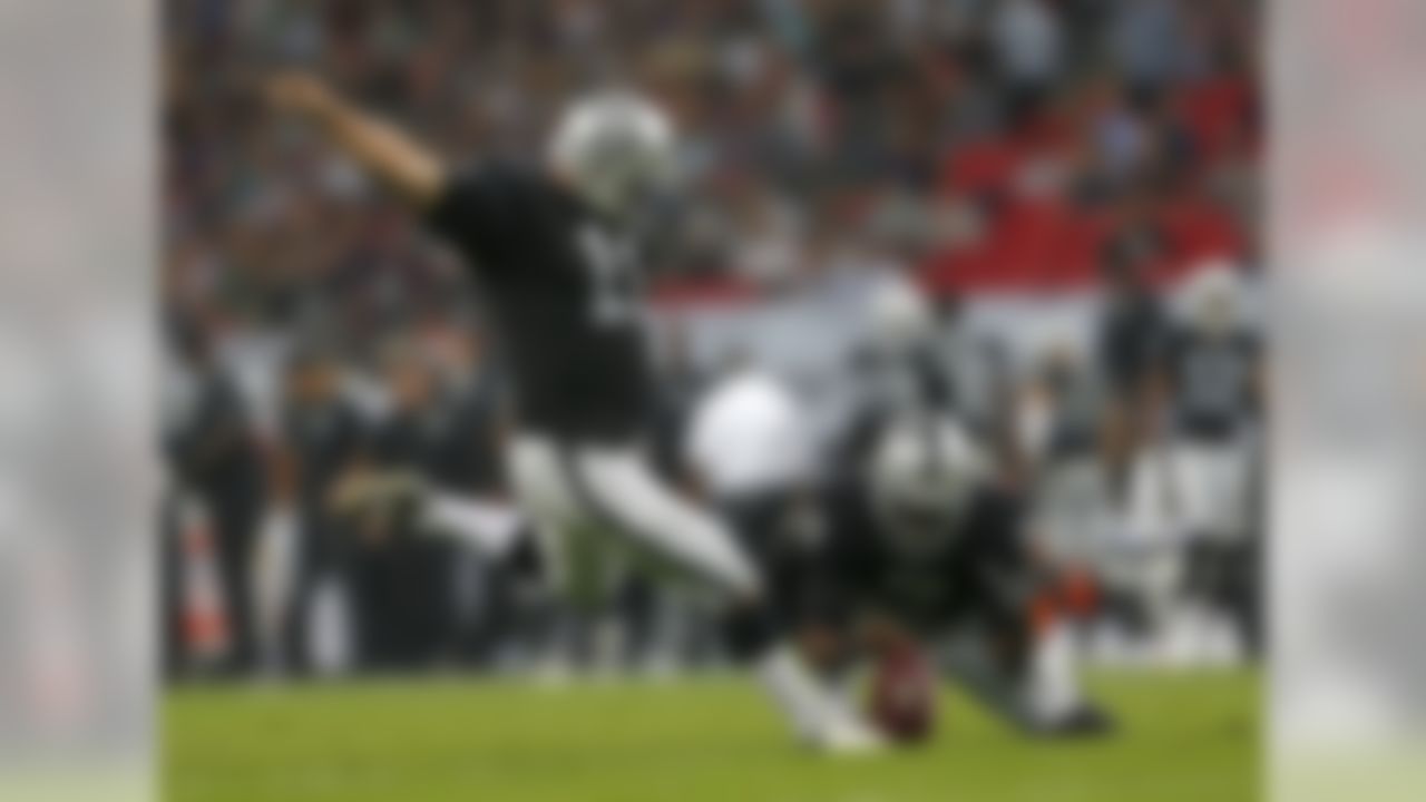 Oakland Raiders kicker Sebastian Janikowski (11) attempts a field goal during an NFL football game against the Miami Dolphins at Wembley Stadium on Sunday September 28, 2014 in London, England. Miami won 38-14. (Ben Liebenberg/NFL)