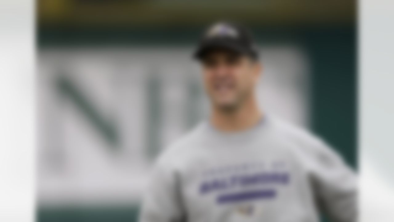 Baltimore Ravens head coach John Harbaugh looks on as his players warm up during an NFL Super Bowl XLVII football practice on Wednesday, Jan. 30, 2013, in New Orleans. The Ravens face the San Francisco 49ers in Super Bowl XLVII on Sunday, Feb. 3. (AP Photo/Patrick Semansky)