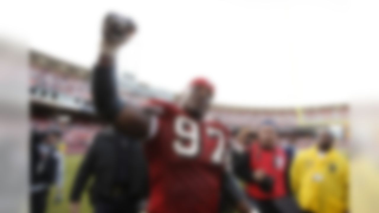 SAN FRANCISCO - DECEMBER 23: Defensive lineman Bryant Young #97 of the San Francisco 49ers thanks the crowd after his last home game after 14 season in a game against the Tampa Bay Buccaneers on December 23, 2007 at Monster Park in San Francisco, California. San Francisco won 21-19. (Photo by Greg Trott/Getty Images)