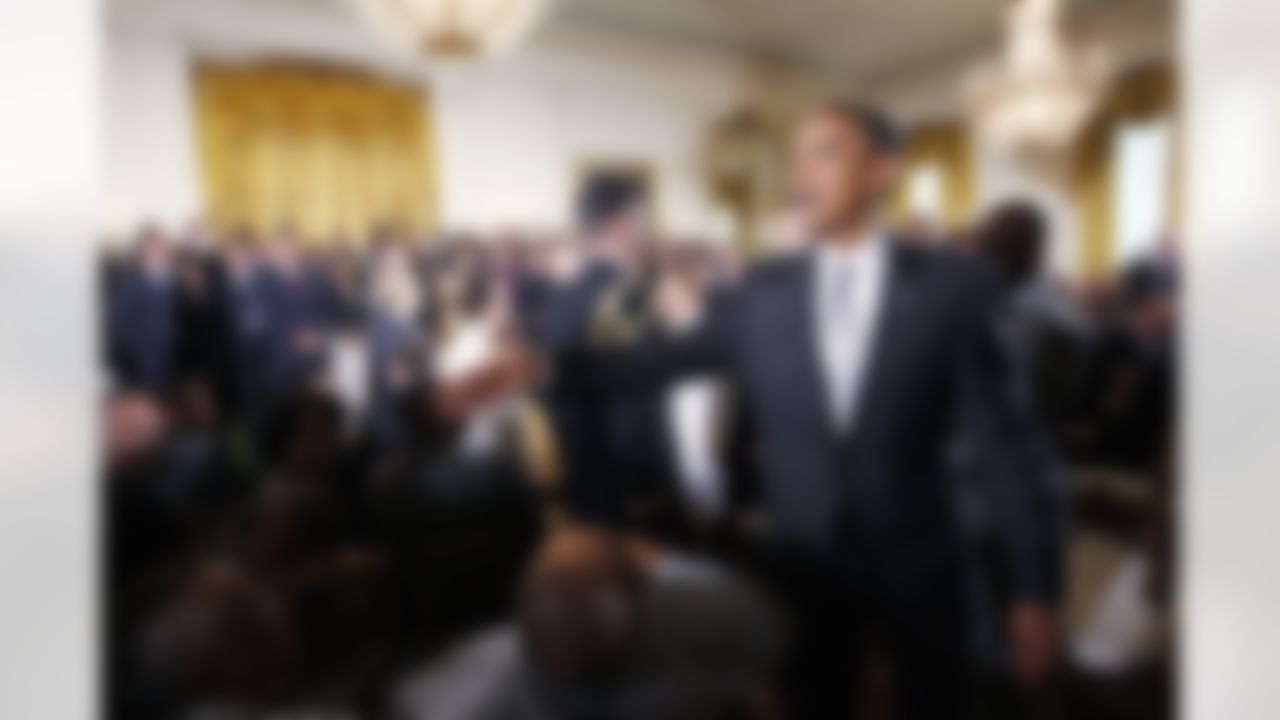 President Barack Obama greets guests in the East Room of the White House in Washington, Monday, Aug. 9, 2010, after a ceremony where he honored the 2009 NFL Super Bowl Football Champions New Orleans Saints. (AP Photo/Charles Dharapak)