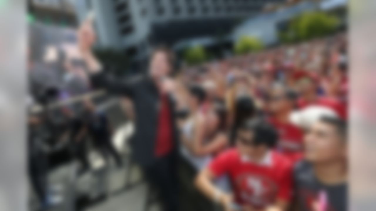 Lead singer Patrick Monohan takes selfies with fans as Train perform for the NFL Kick-Off to 50 event, Wednesday, September 10, 2015 in San Francisco. (Doug Benc/AP Images for NFL)